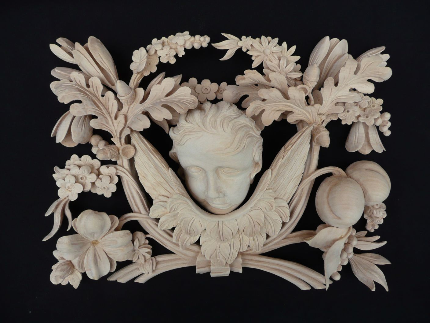 Grinling Gibbons style panel carving in limewood.